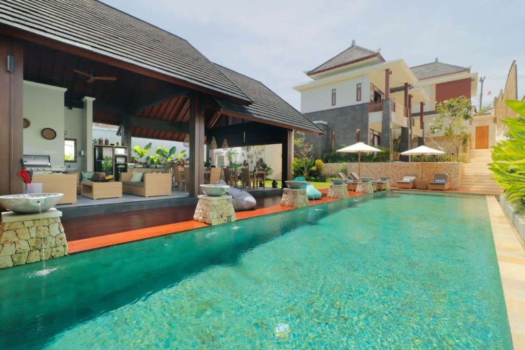 Traditional Balinese villa with large pool and inviting open plan living area for sale in Ungasan. Uluwatu villa bali Buy now.