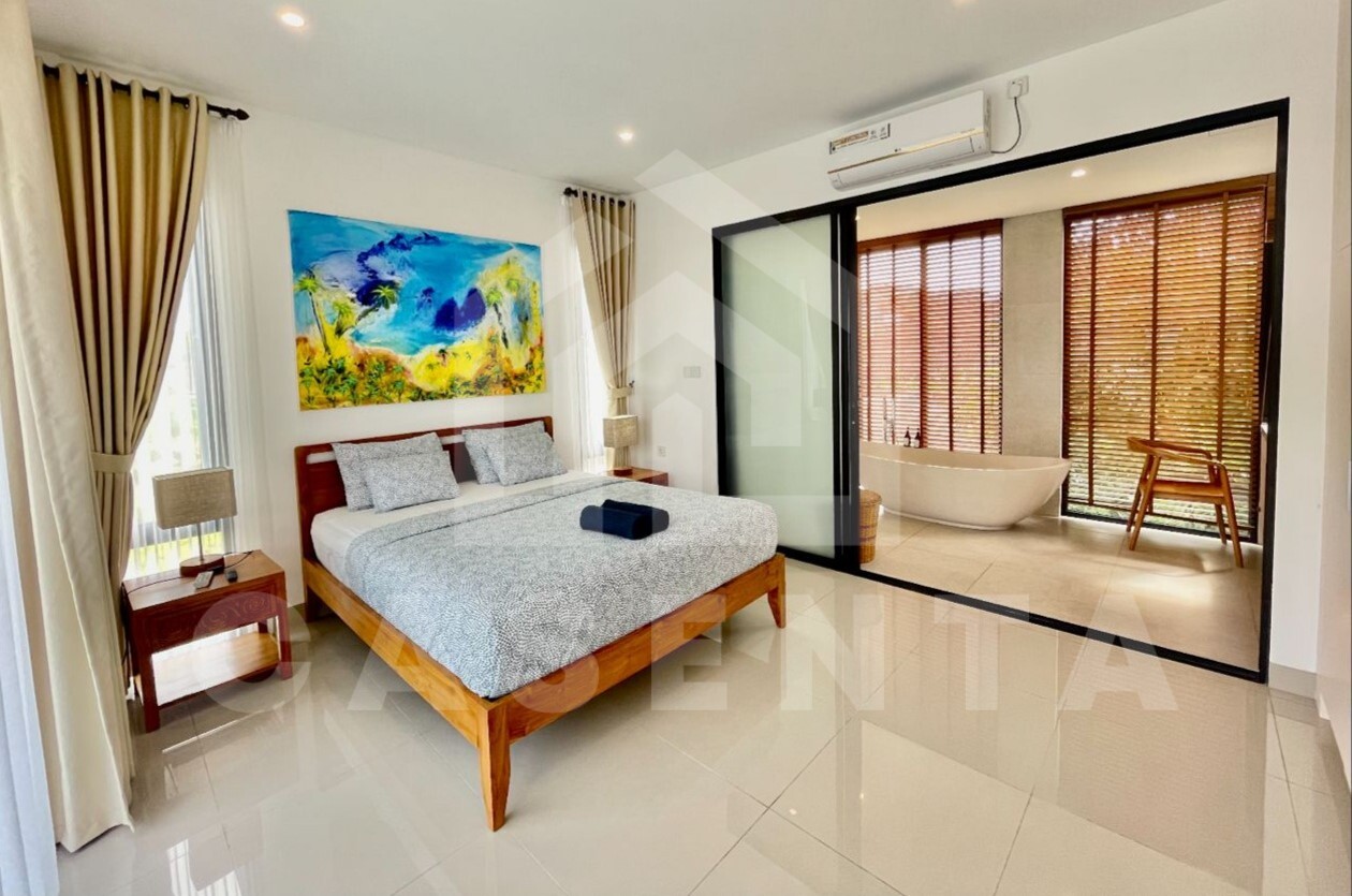 Bedroom with ensuite bathroom inside stunning villa in Seminyak