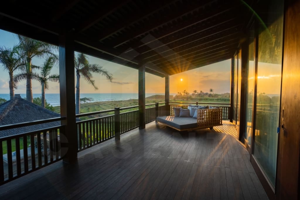 The balcony of a tropical Bali villa for sale on the Tabanan coast