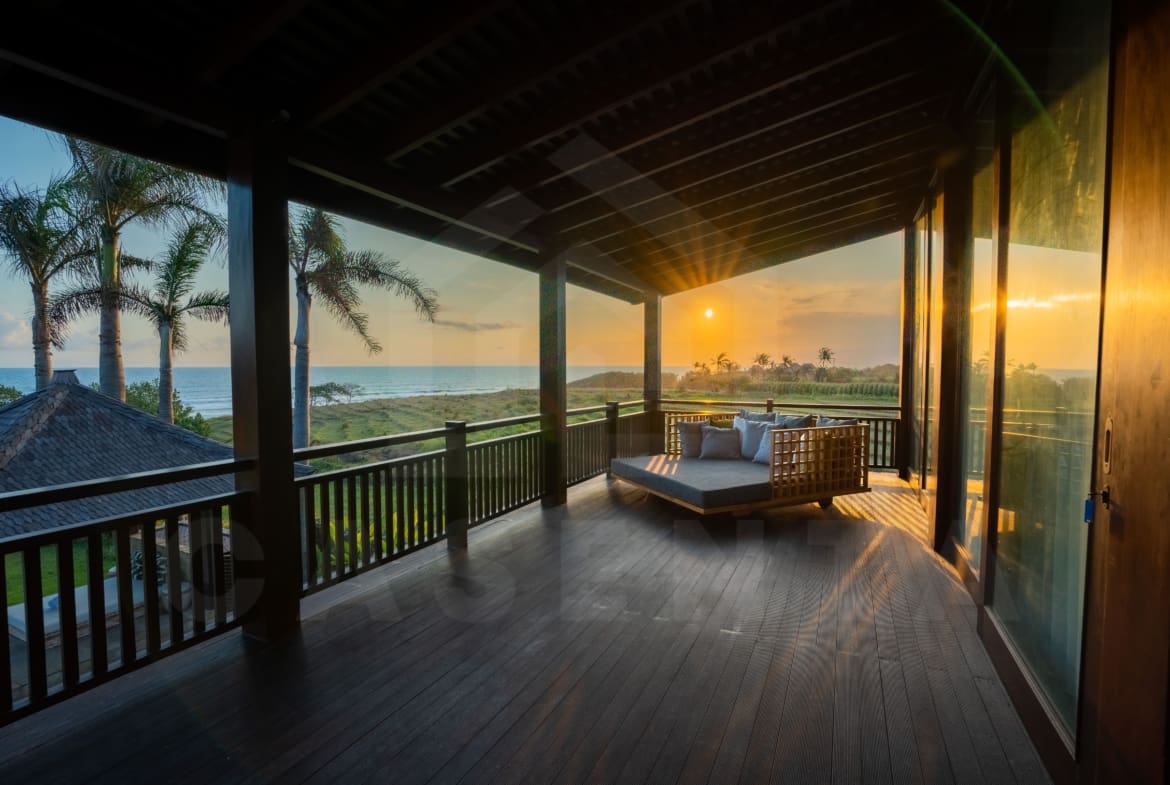 The balcony of a tropical Bali villa for sale on the Tabanan coast