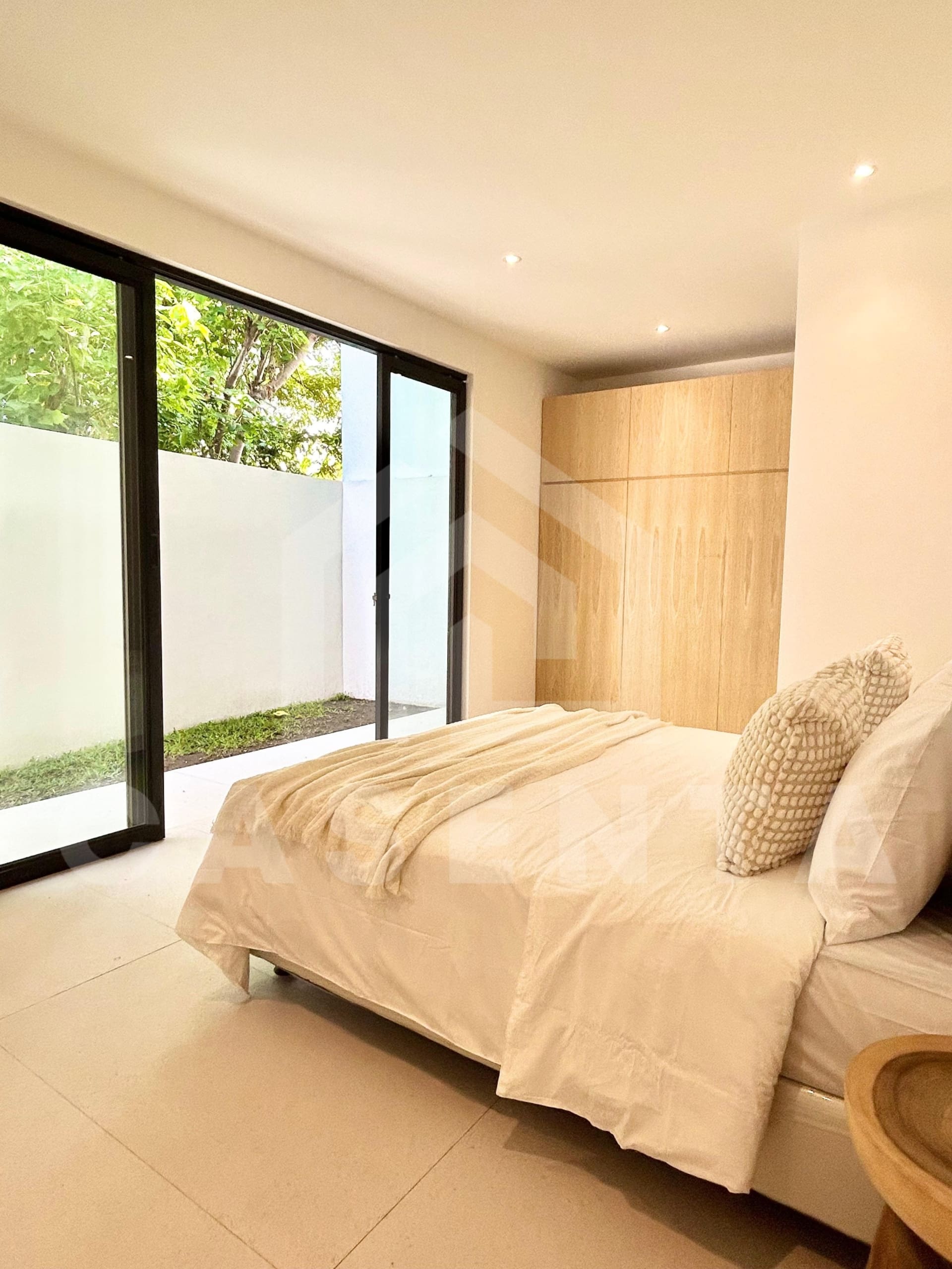 Comfortable bedroom inside a brand new villa in Canggu