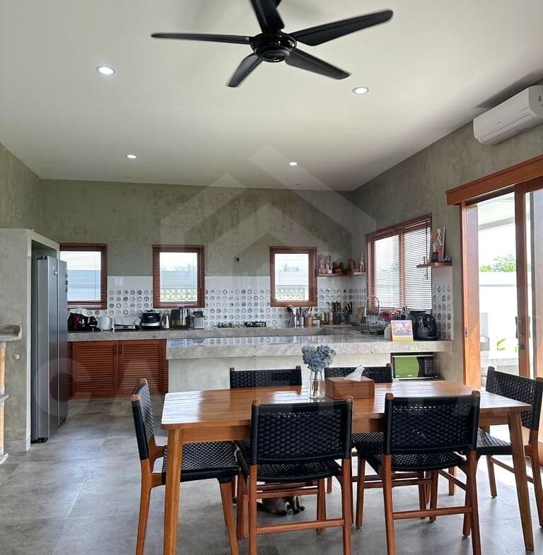 Kitchen/dining area inside 3 bedroom family villa in Ubud
