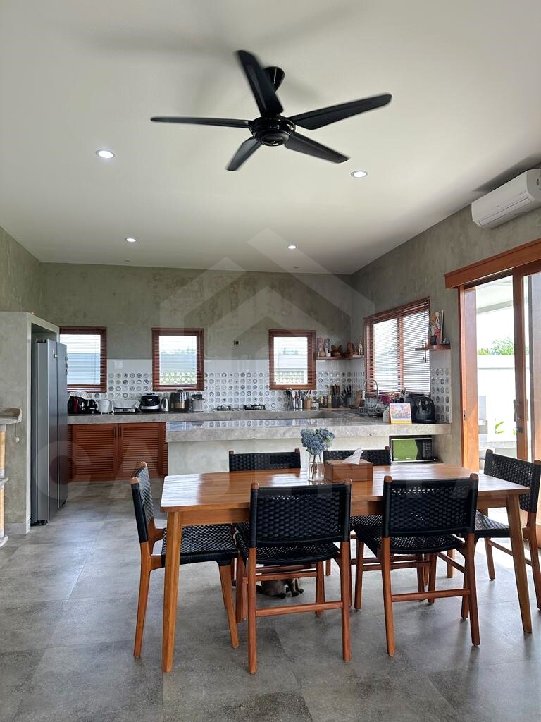Kitchen/dining area inside 3 bedroom family villa in Ubud