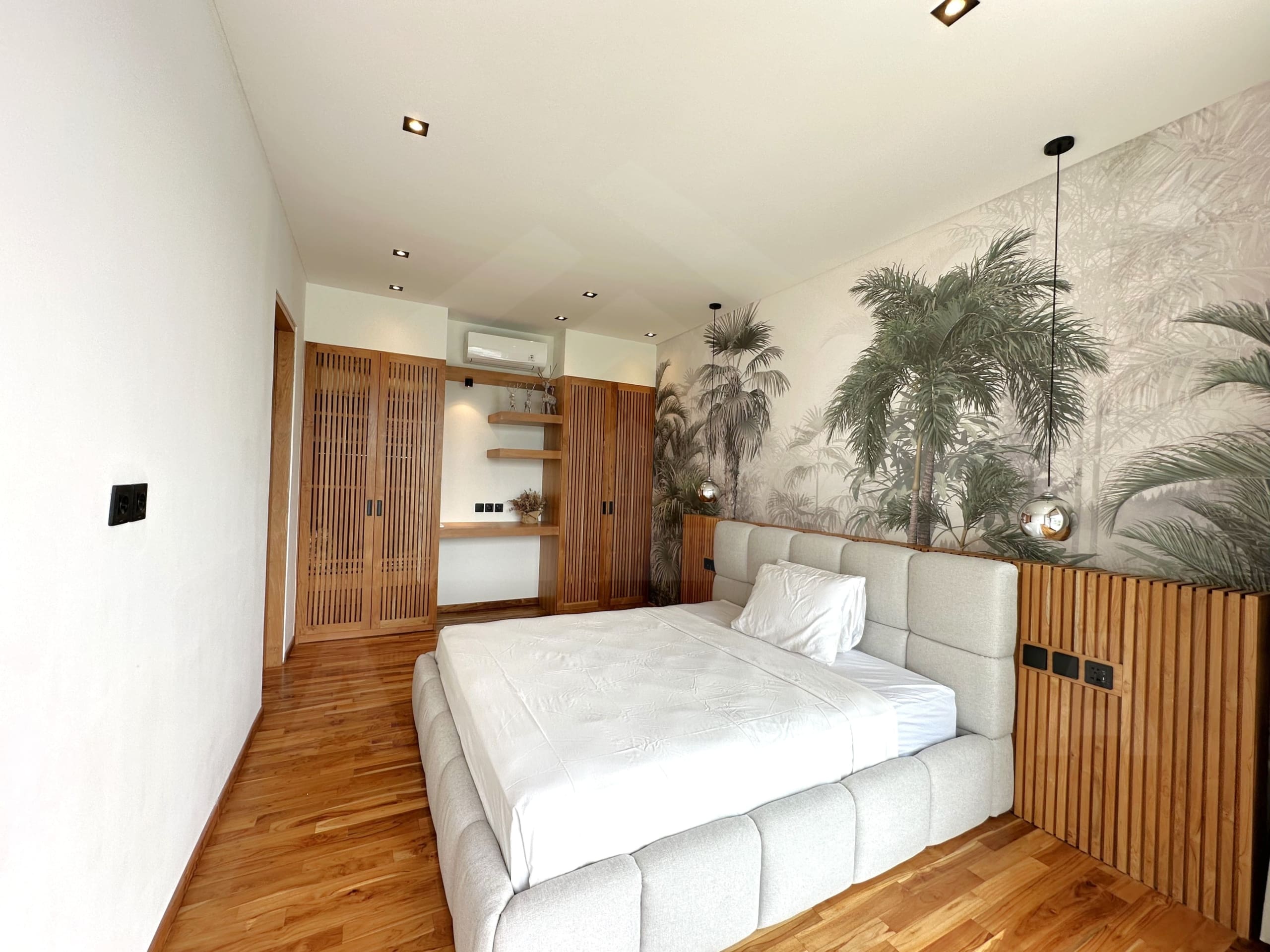 Bedroom inside fabulous villa with great rental potential in Tumbak Bayuh