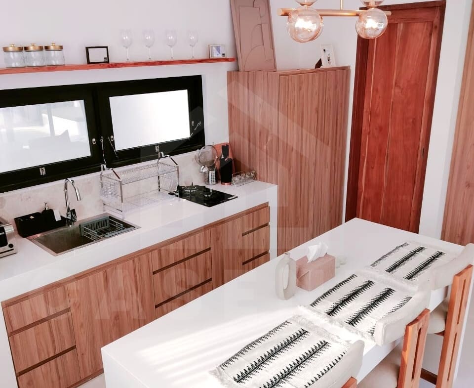 Kitchen inside trendy loft in the vicinity of Seseh beach