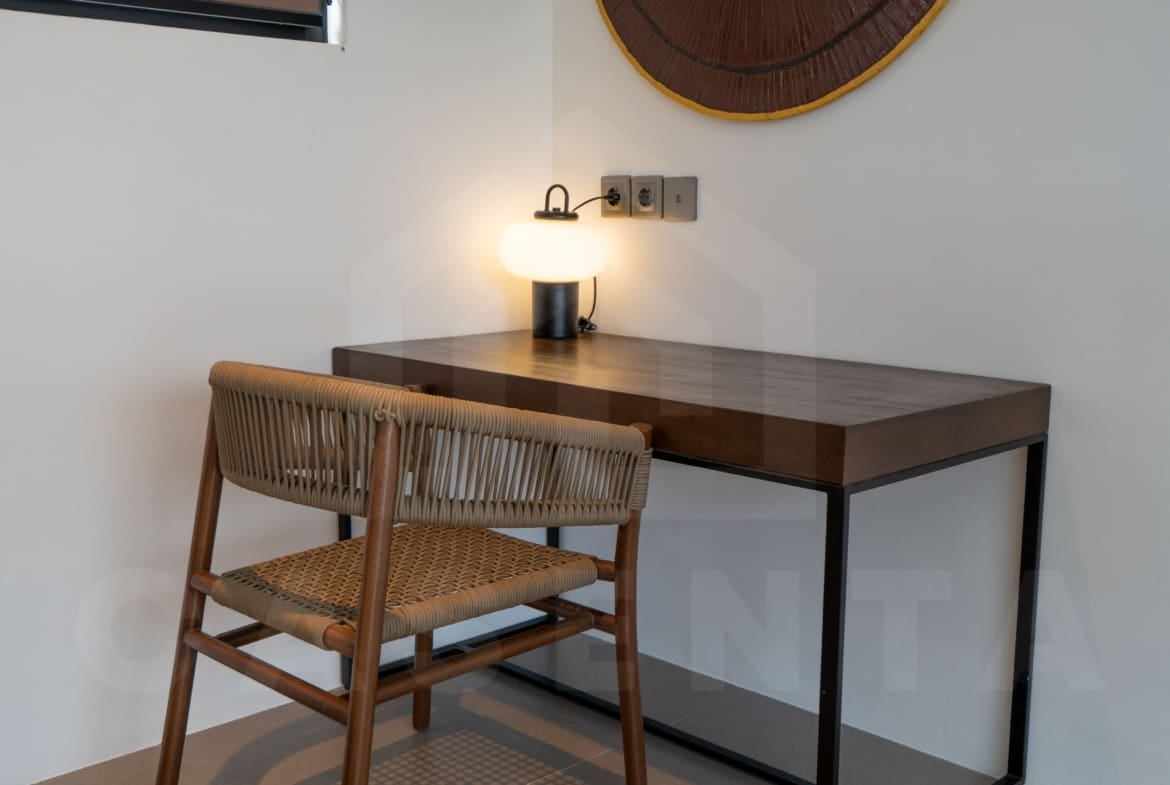 Working space inside stylish apartment in Babakan