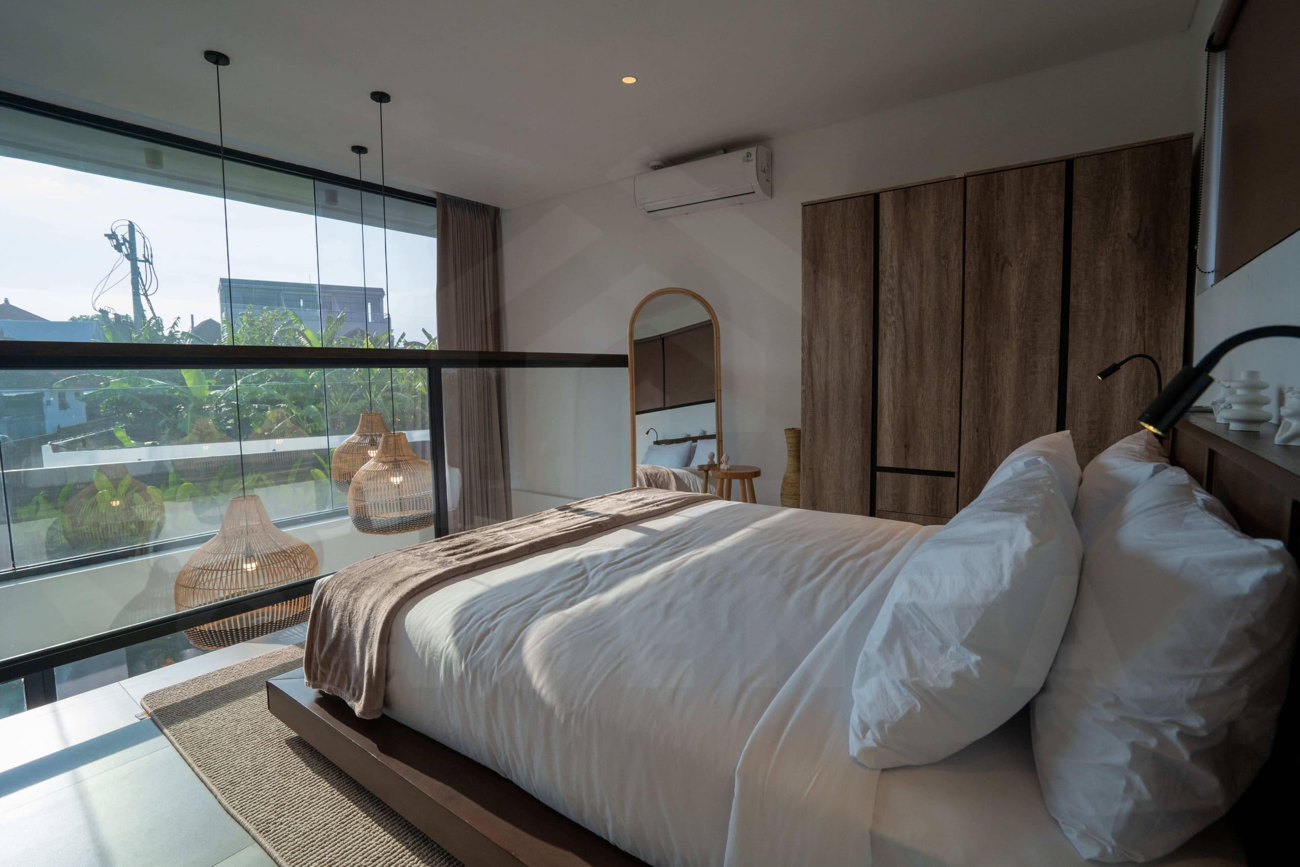 Bedroom inside stylish apartment in Babakan