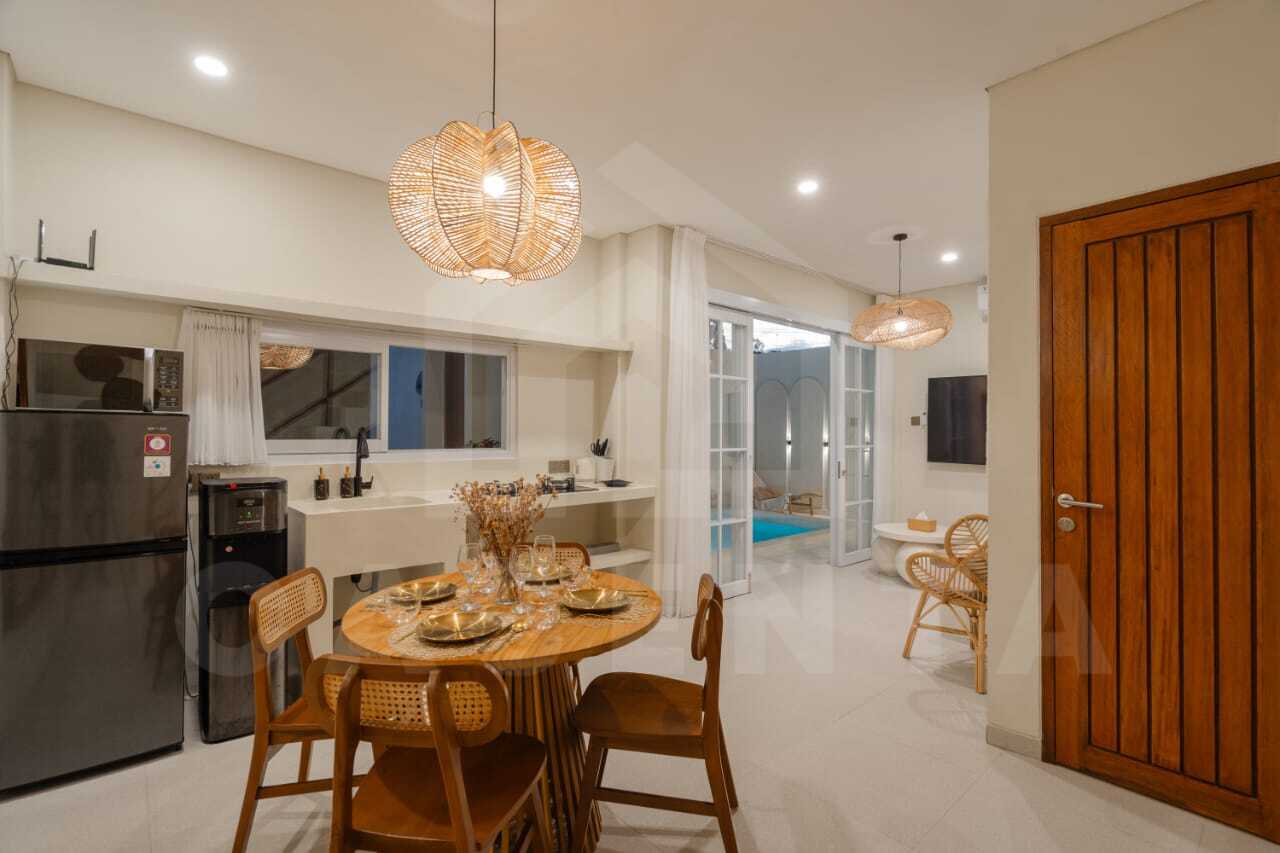 Kitchen/dining space inside charming Mediterranean villa in Ungasan