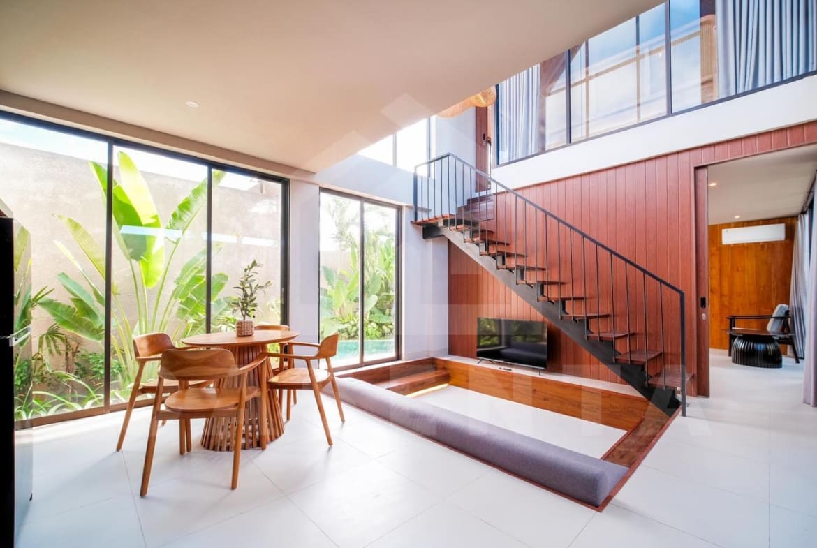 Spacious living and dining area in Cemagi villa