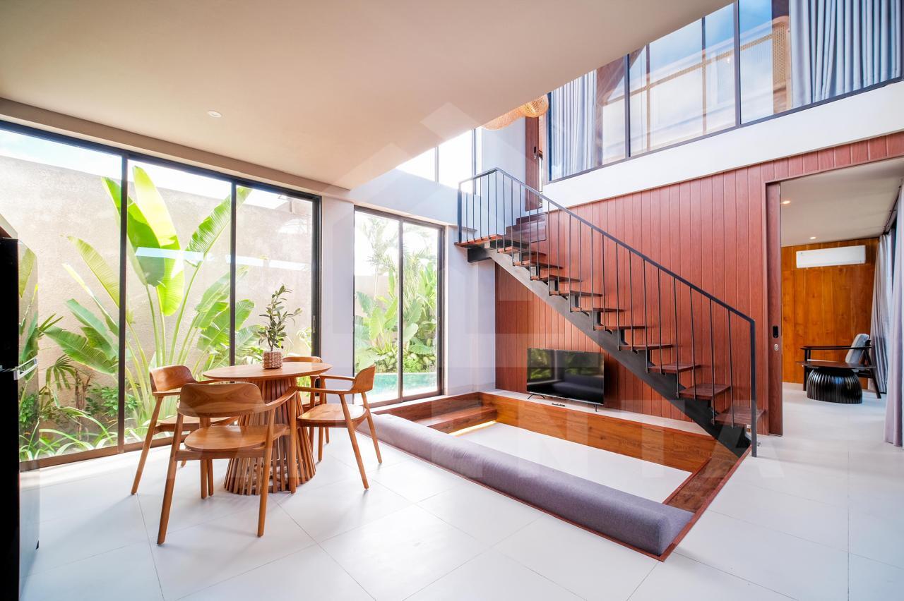 Spacious living and dining area in Cemagi villa