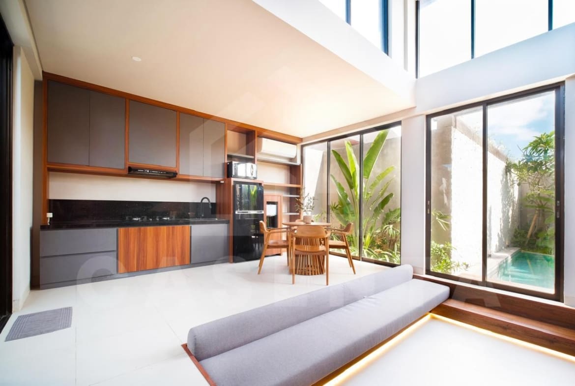 Modern open-plan living and kitchen area in Cemagi villa