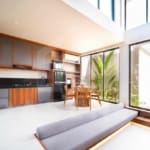 Modern open-plan living and kitchen area in Cemagi villa