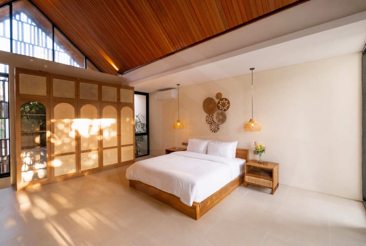 Bedroom in modern Buduk Bali villa with pool view