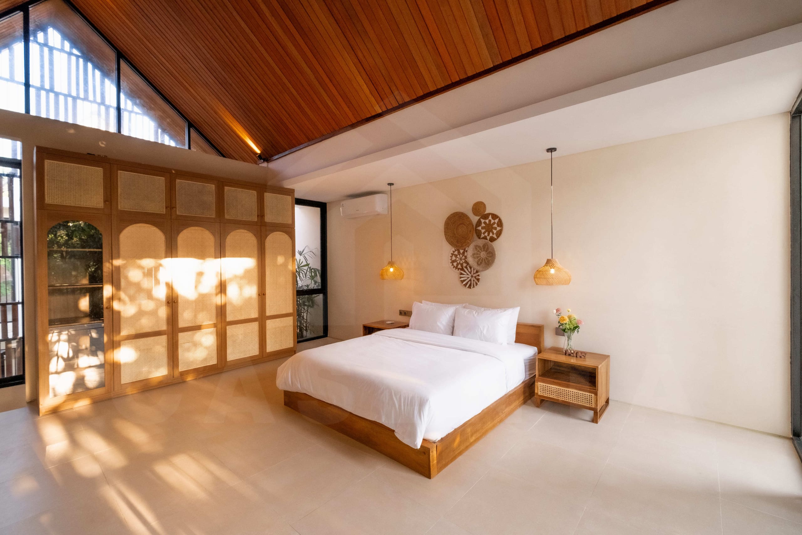 Bedroom in modern Buduk Bali villa with pool view