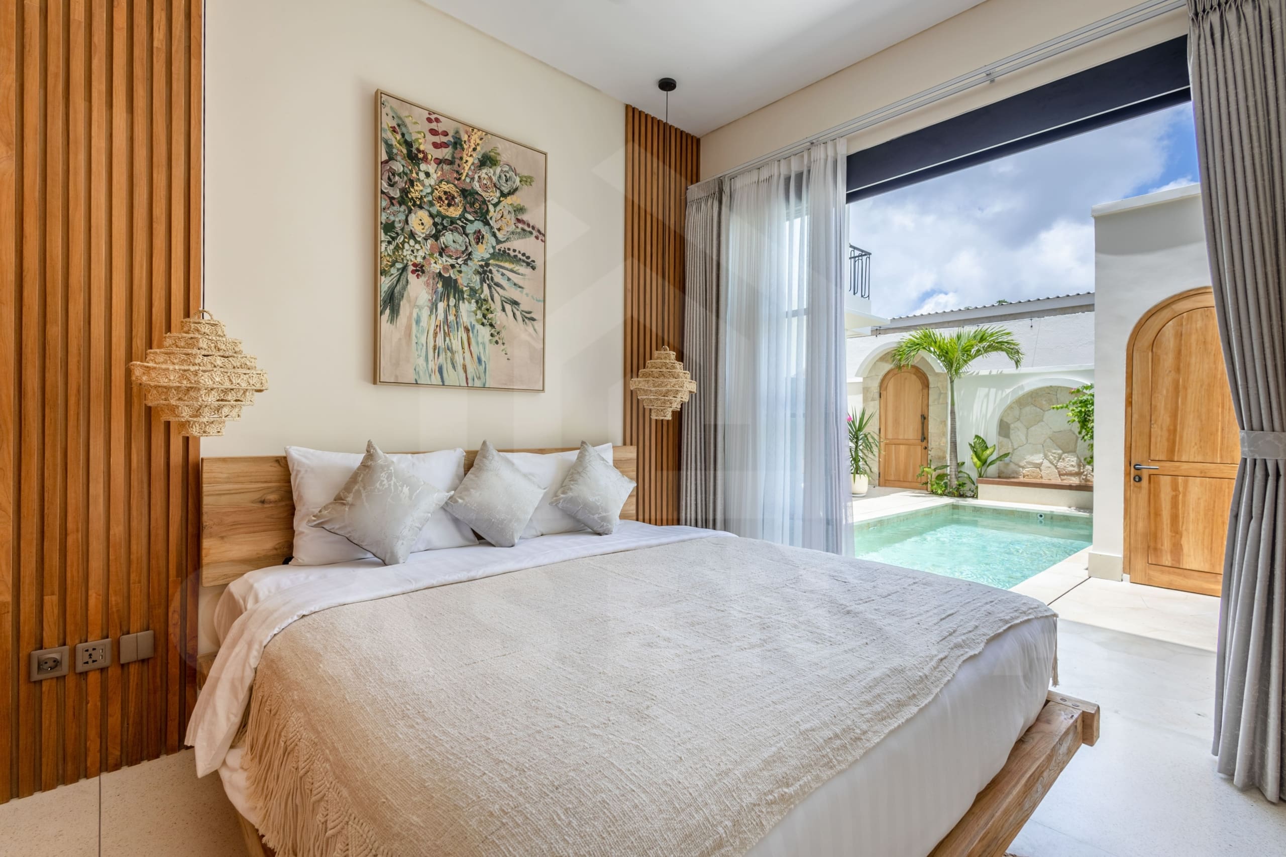 Elegant bedroom with pool access in Balangan leasehold villa