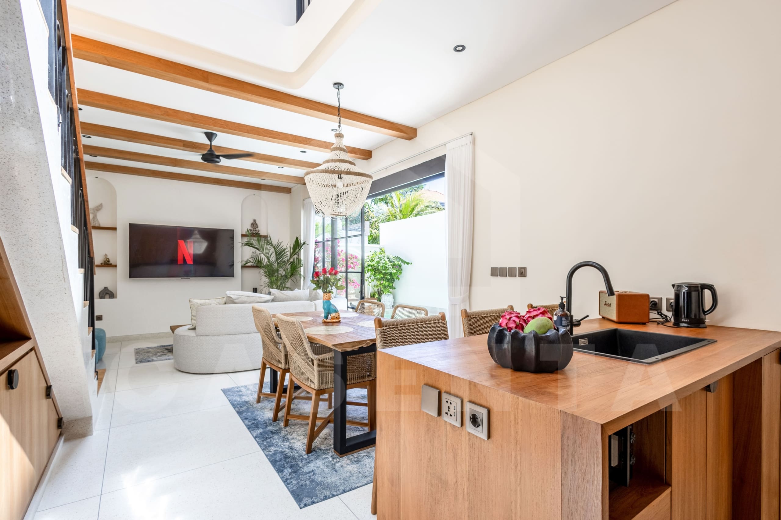 Open-plan kitchen and dining space in Balangan leasehold villa