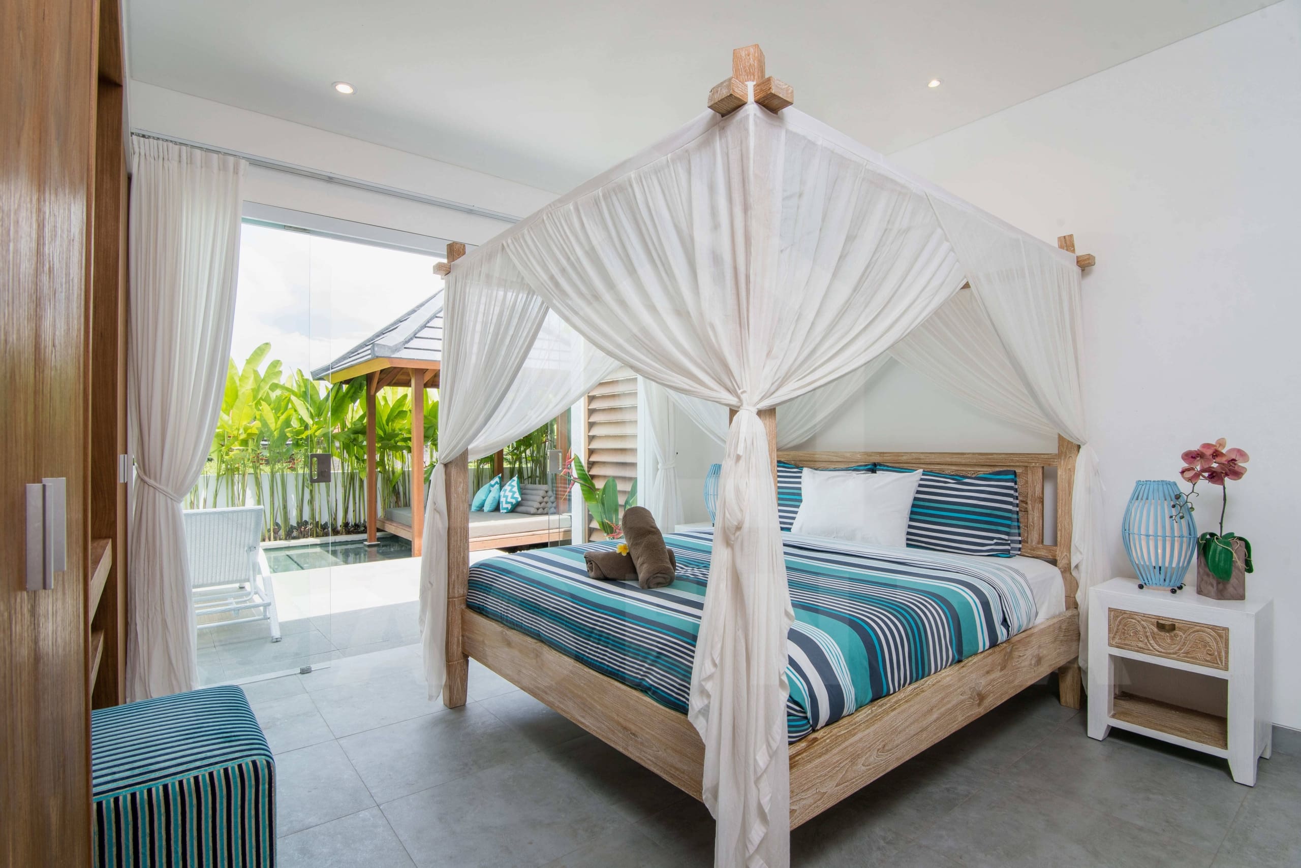 Master bedroom with pool access in leasehold villa Berawa Canggu