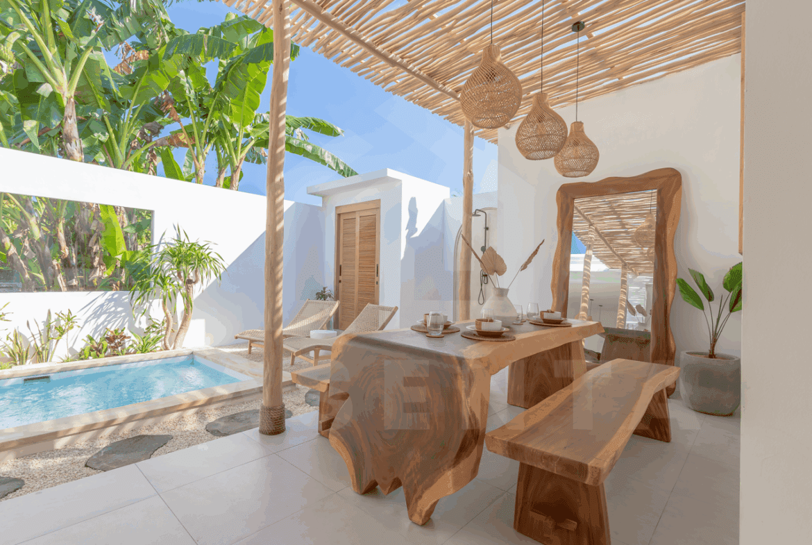 Open-plan dining and lounge area in Tabanan villa