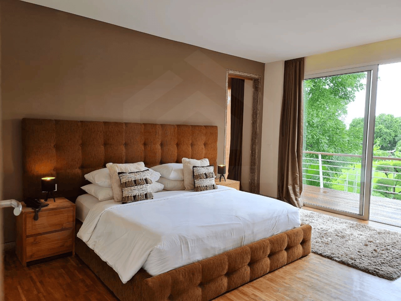 Bright master bedroom in Kerobokan family villa