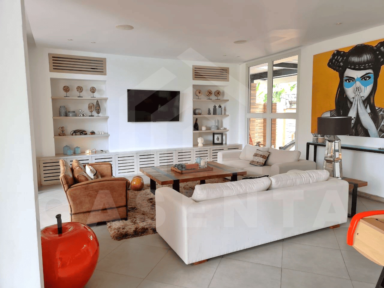 Stylish living and dining interior of family villa in Kerobokan