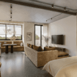 Modern Berawa apartment living and bedroom area with warm lighting