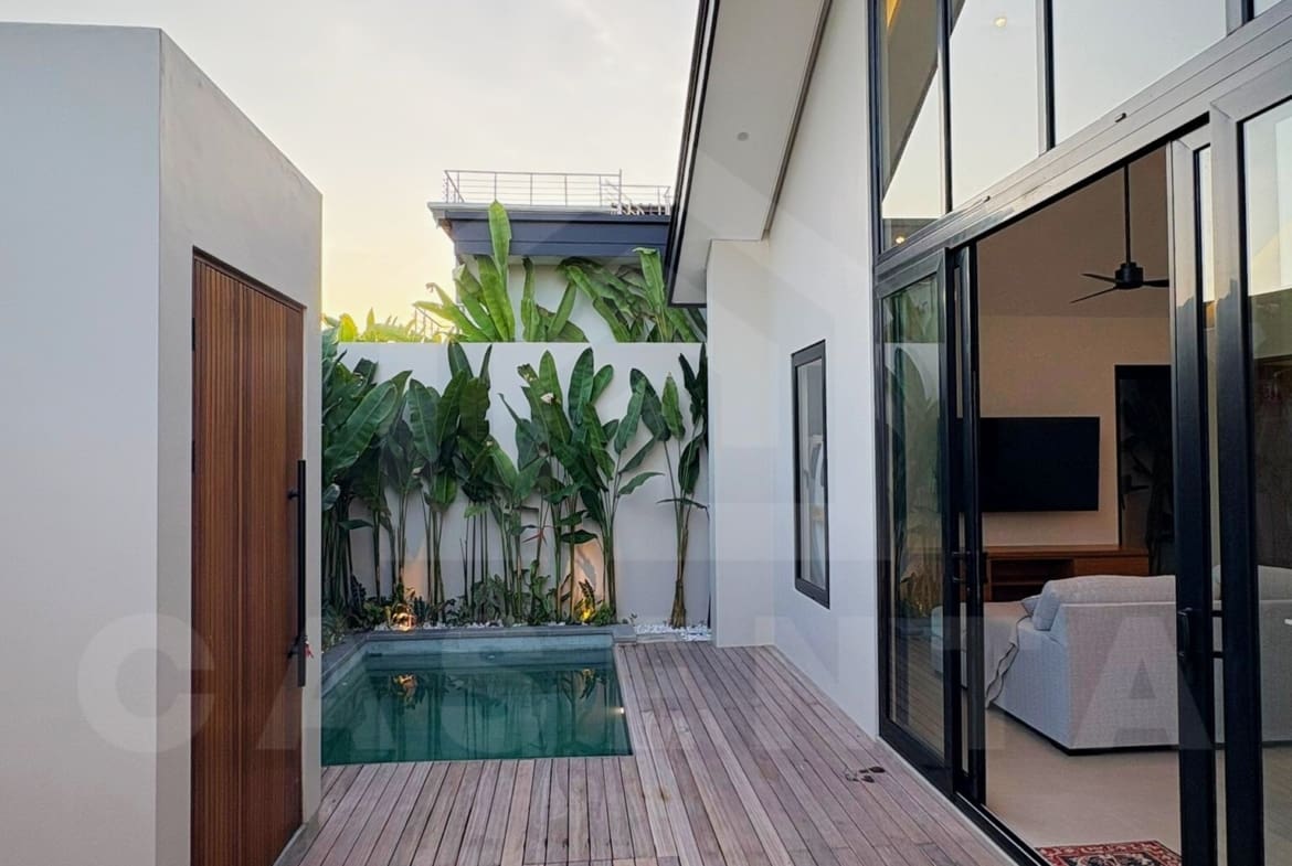 Private pool and wooden deck at Tumbak Bayuh villa, Bali