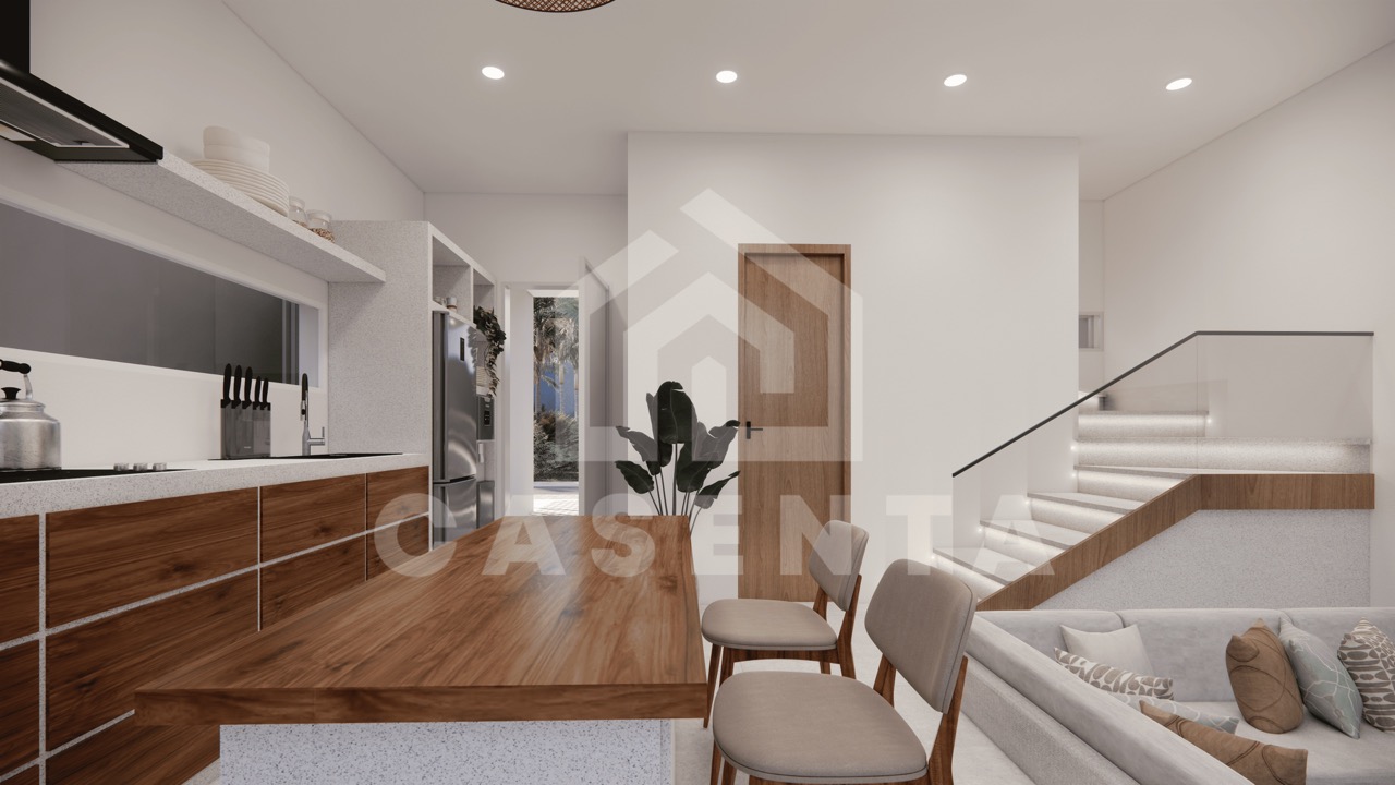 Open-plan kitchen with island seating and modern finishes