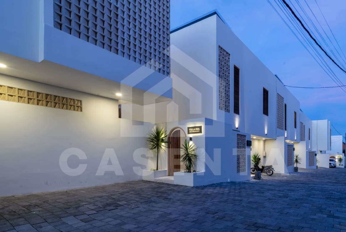 Exterior view of modern villa complex in Canggu at dusk