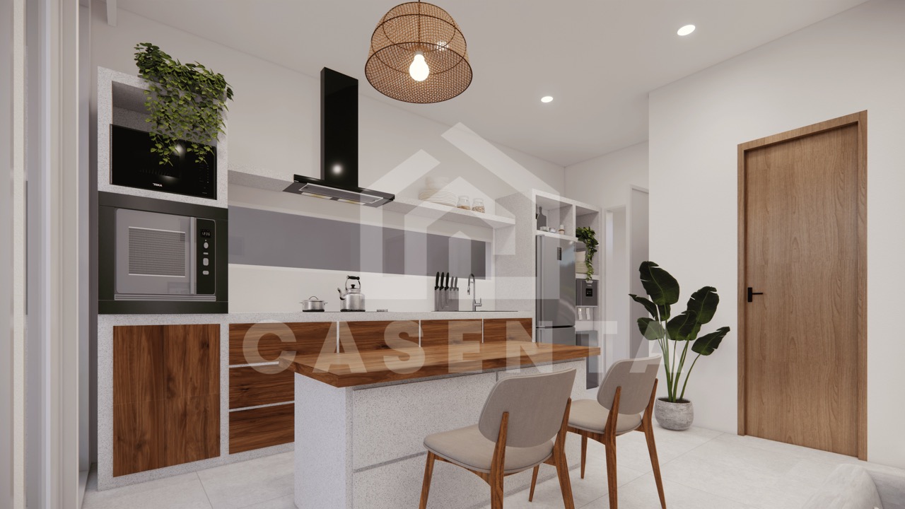 Enclosed kitchen with built-in appliances and dining island