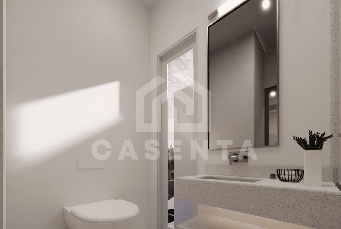 Ensuite bathroom with large mirror and toilet
