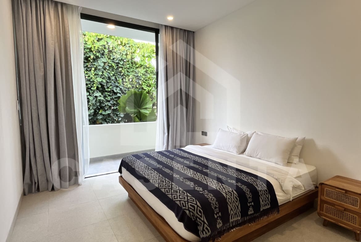 Second bedroom with natural light in modern Canggu villa