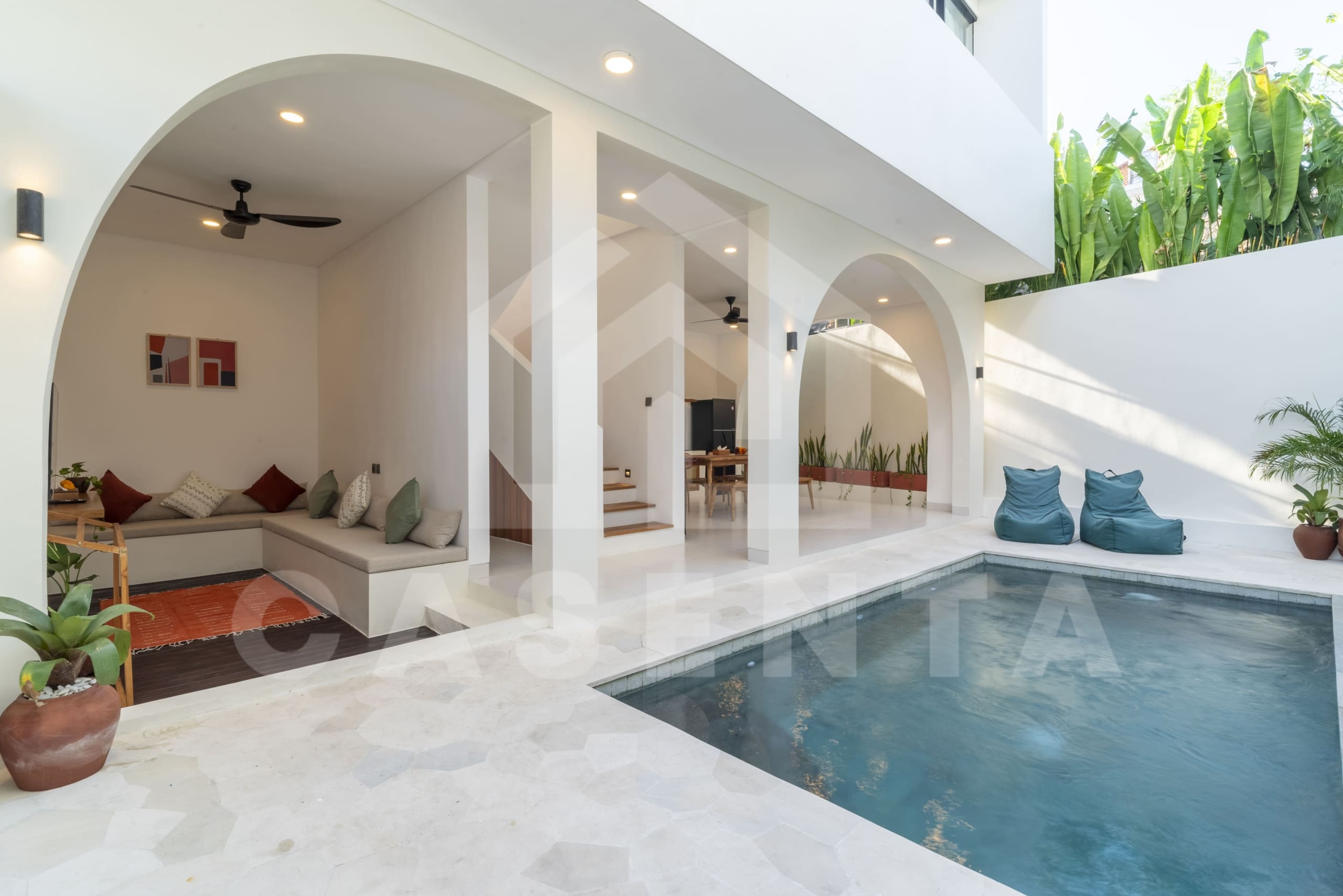 Poolside lounge and covered terrace in Canggu villa