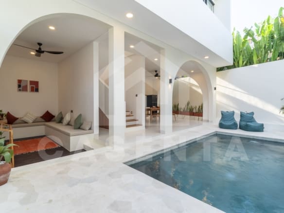Poolside lounge and covered terrace in Canggu villa