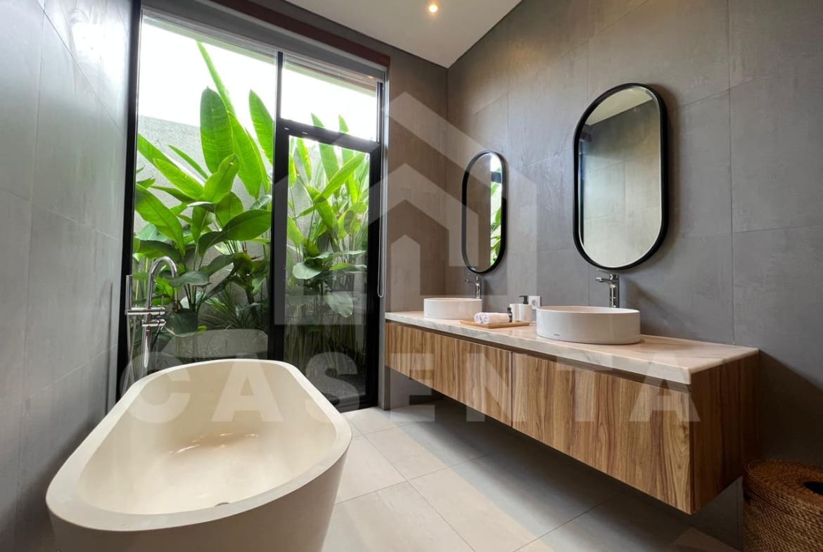 Walk-in rain shower bathroom in Pererenan villa