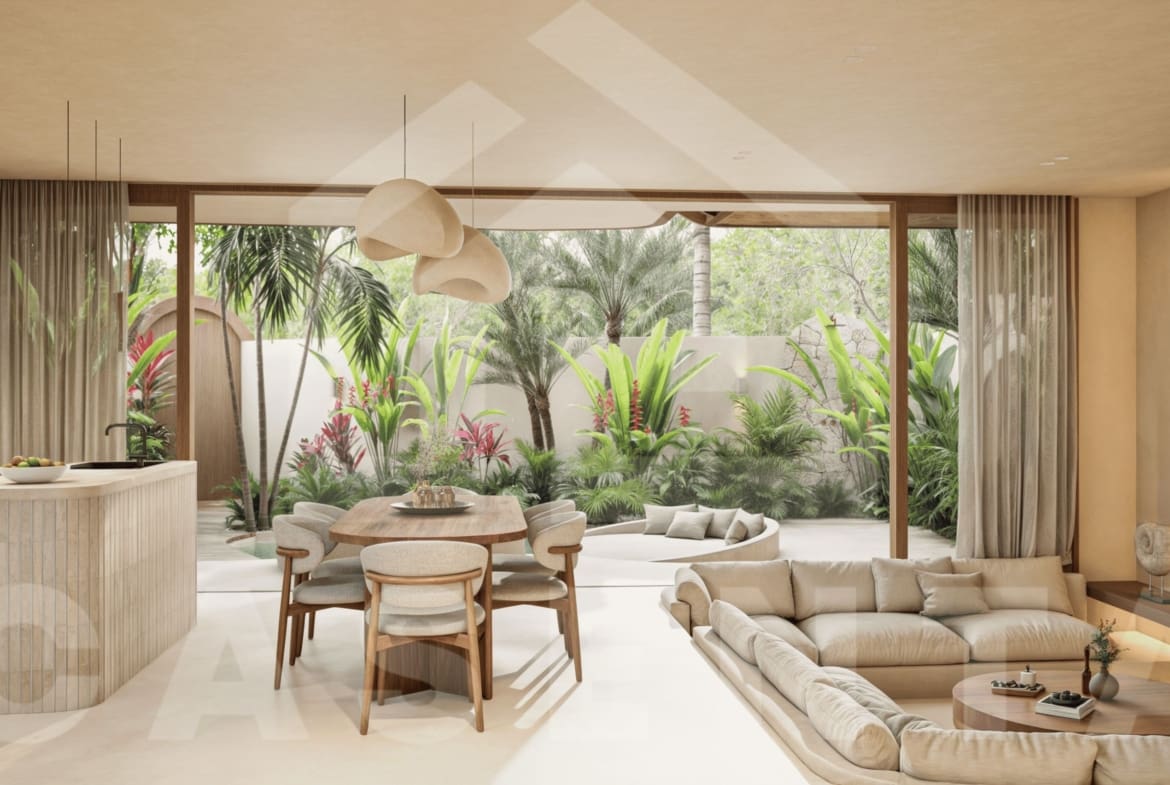 Sunken living area in Bukit Peninsula Villa with modern tropical design