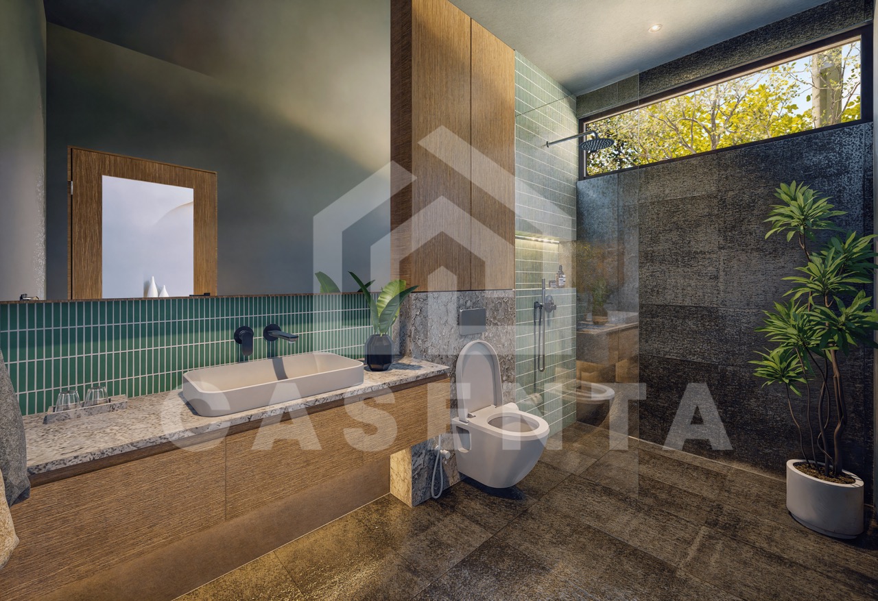 Modern bathroom in Ubud leasehold villa with walk-in shower, green tiles, stone finishes, and natural light