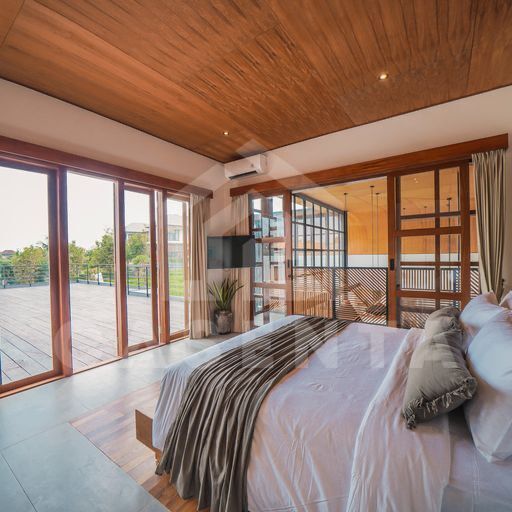 Spacious bedroom with terrace access in cemagi villa