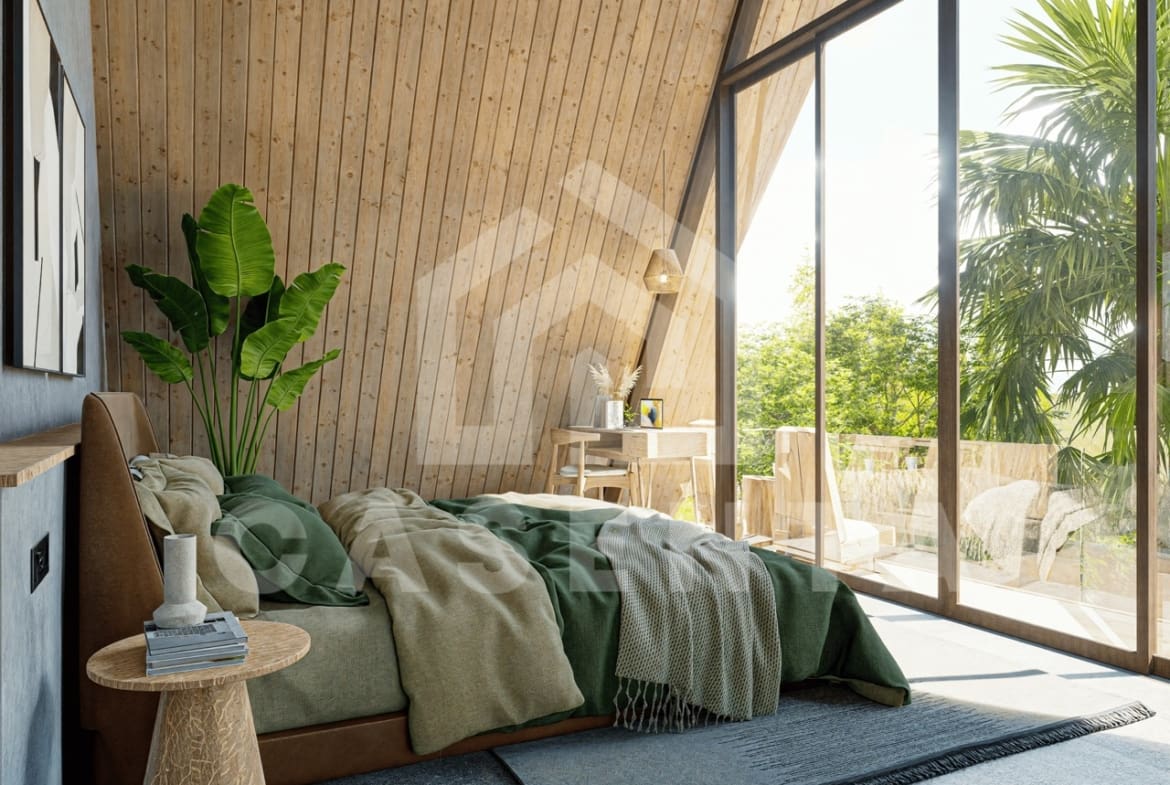 Bedroom in Ubud leasehold villa with private balcony, sloped wooden ceiling, and tropical garden views