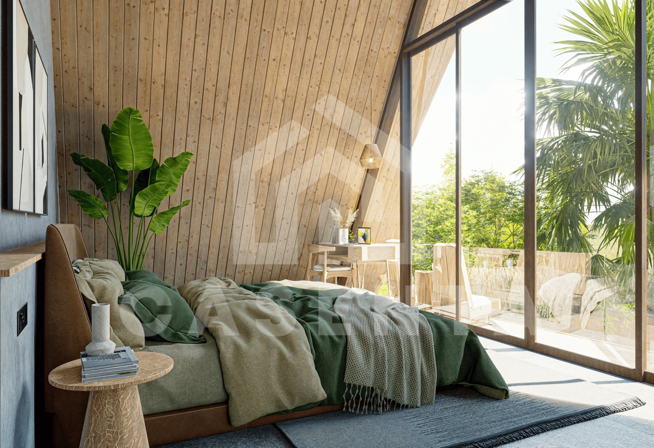 Bedroom in Ubud leasehold villa with private balcony, sloped wooden ceiling, and tropical garden views