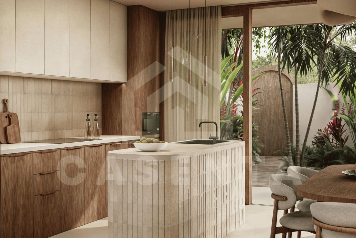 Modern kitchen with island in Bukit Peninsula Villa complex