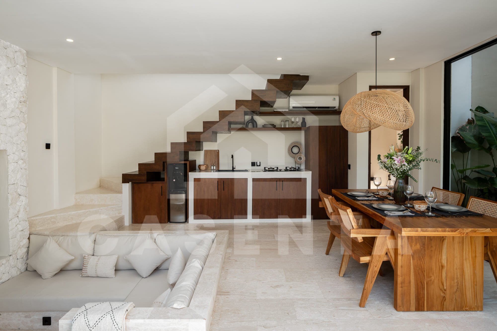 Open-plan living and dining area in Batu Bolong Villa