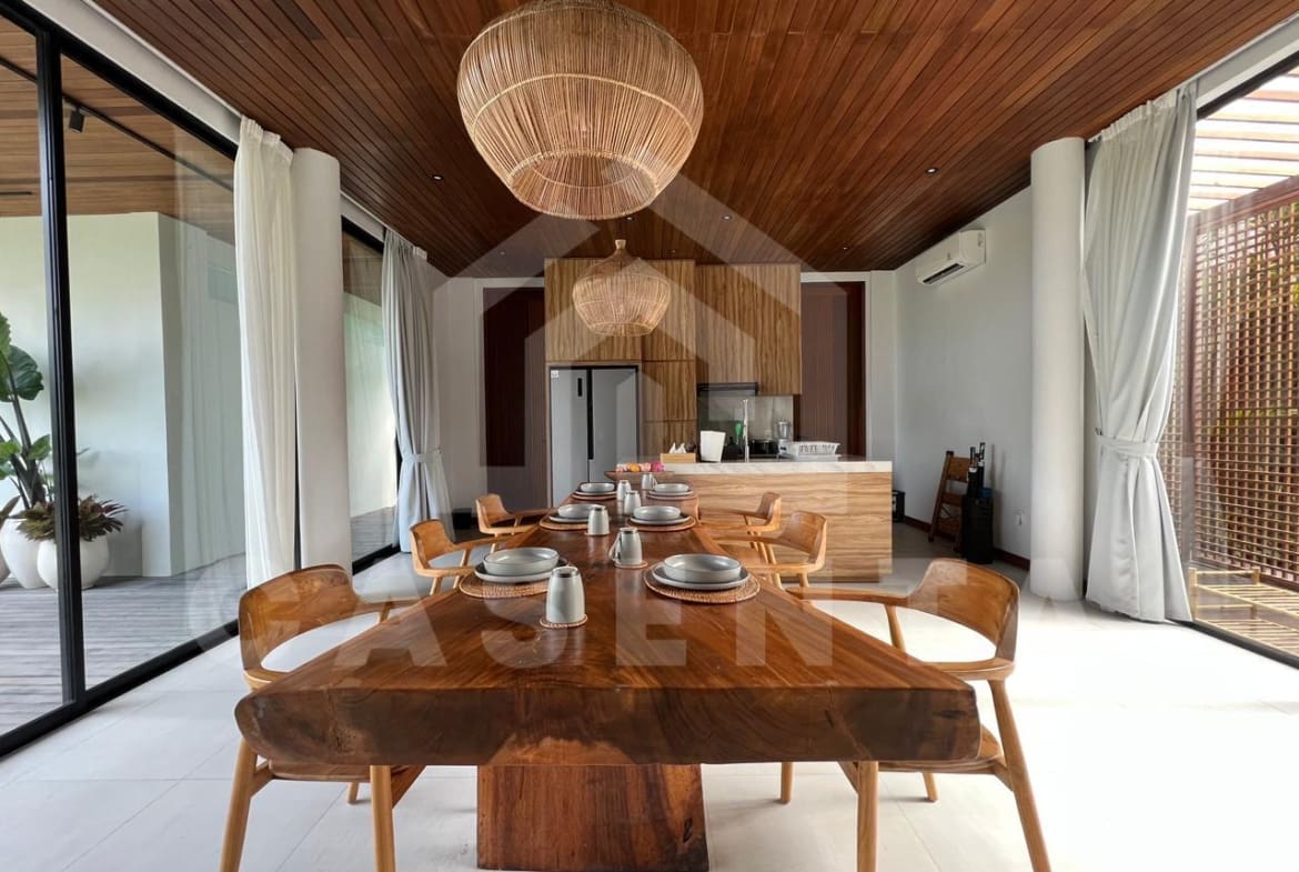 Fully equipped kitchen and dining area in Pererenan villa