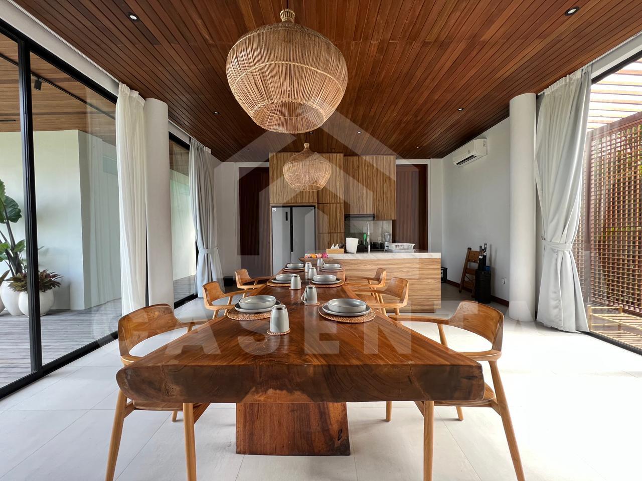 Fully equipped kitchen and dining area in Pererenan villa