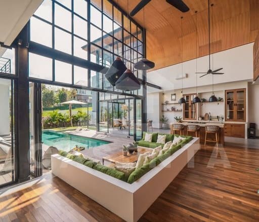 Sunken living area with pool view in cemagi villa