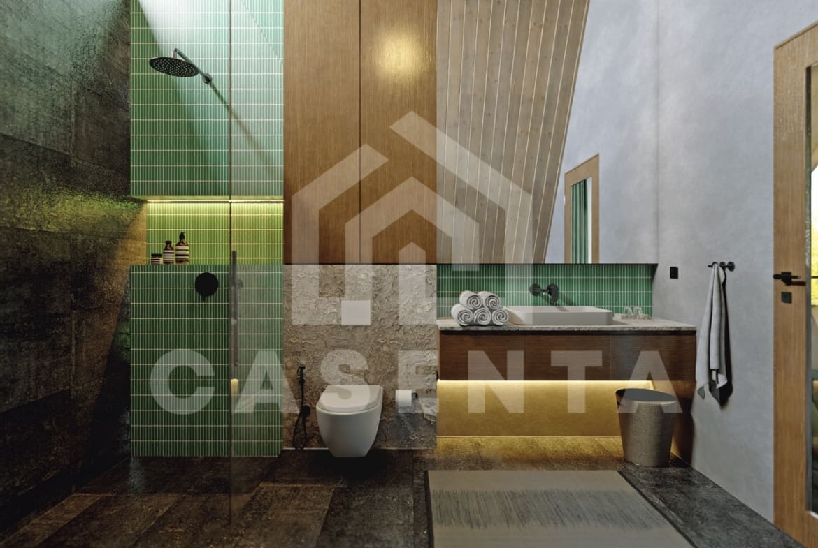 Modern ensuite bathroom in Ubud leasehold villa with floating vanity, green tiles, and rainfall shower