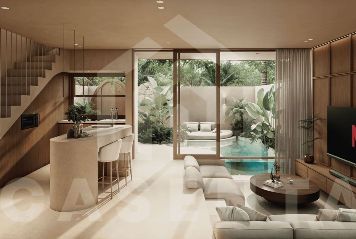 Open-plan living and kitchen area in Uluwatu tropical villa