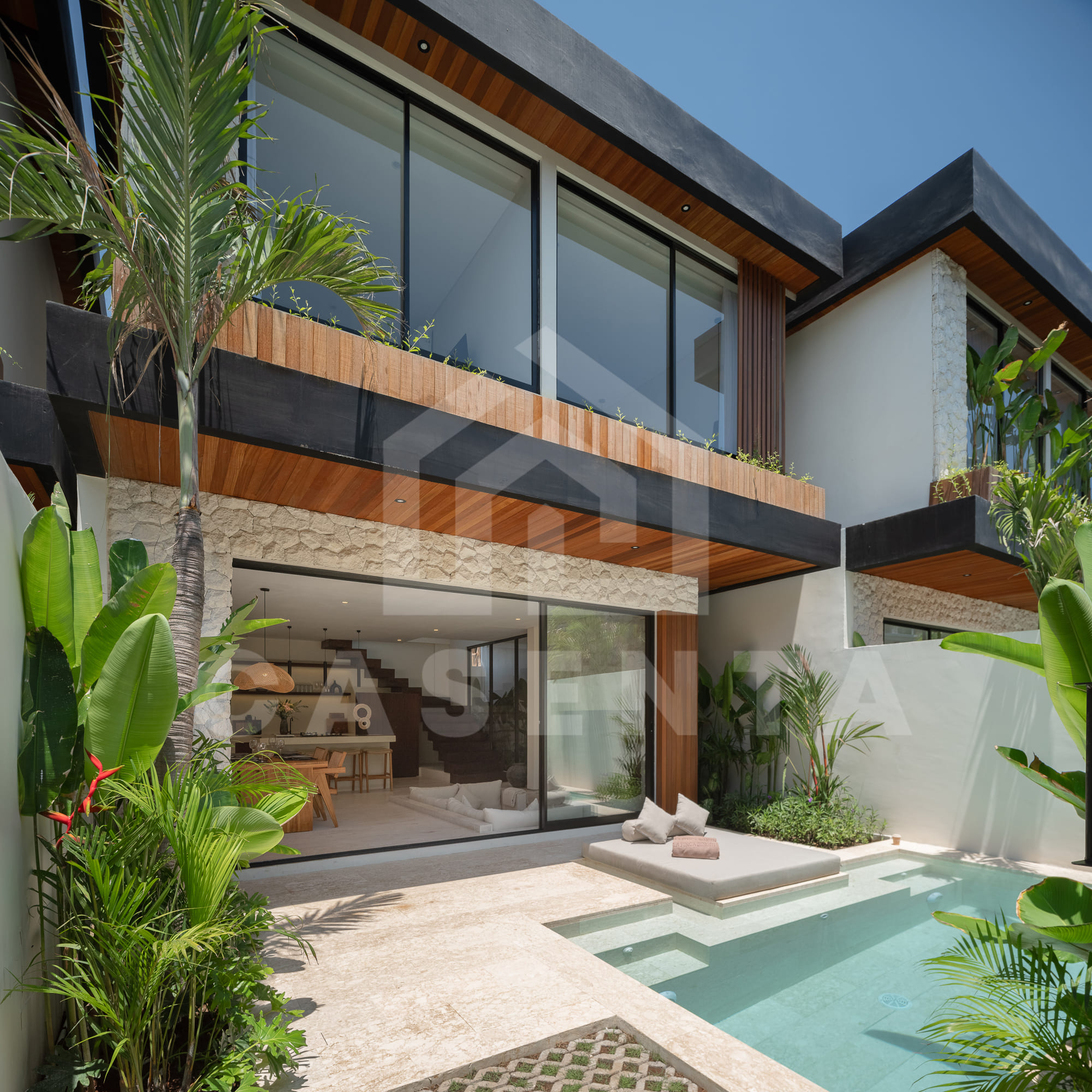 Private pool courtyard in batu bolong villa with tropical landscaping