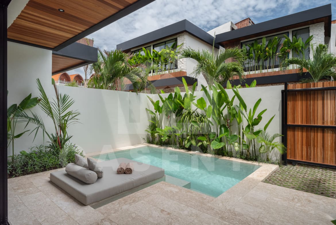 Rectangular private pool with sunken lounge in batu bolong villa