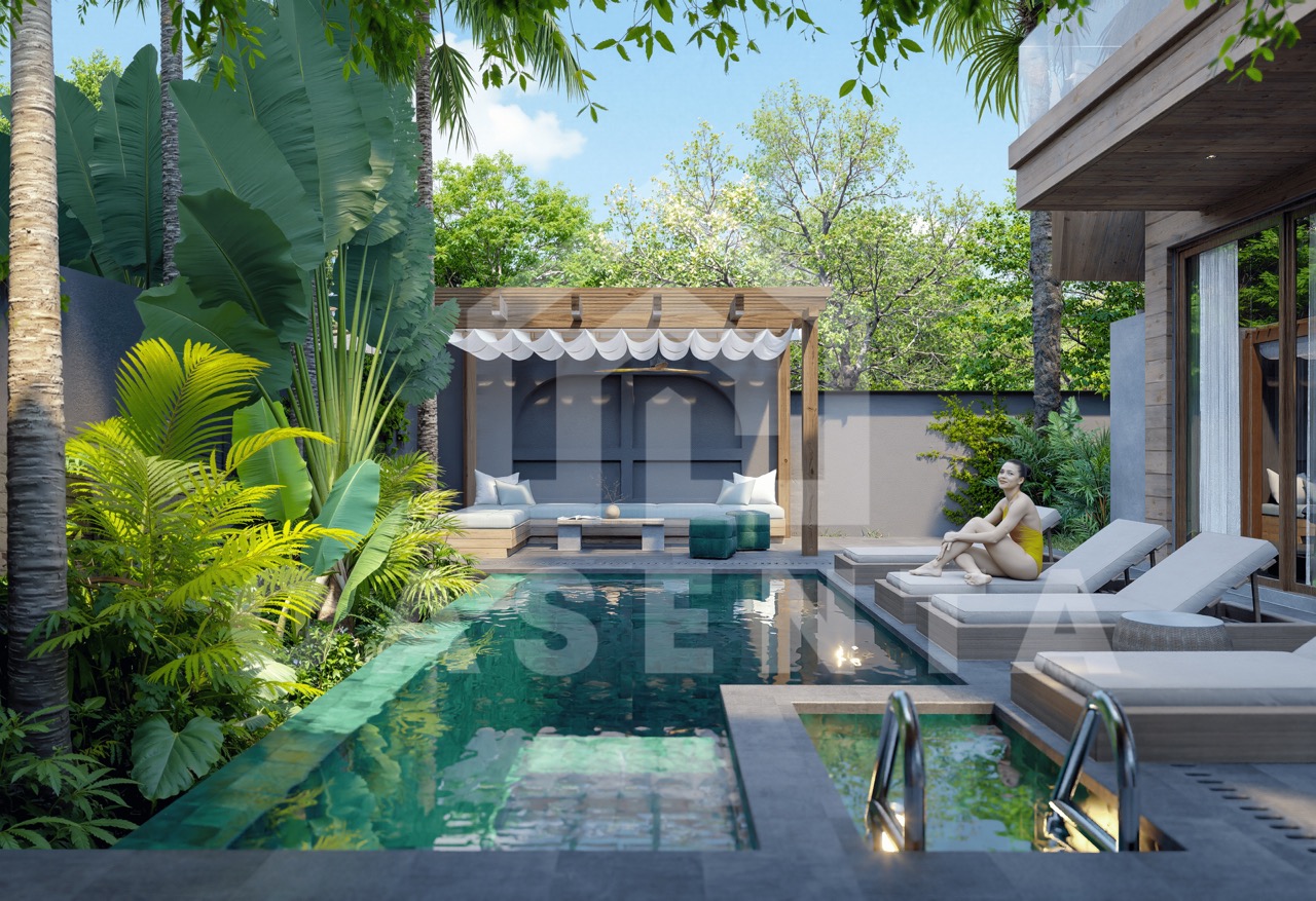 Private swimming pool in Ubud leasehold villa surrounded by tropical plants and sun loungers