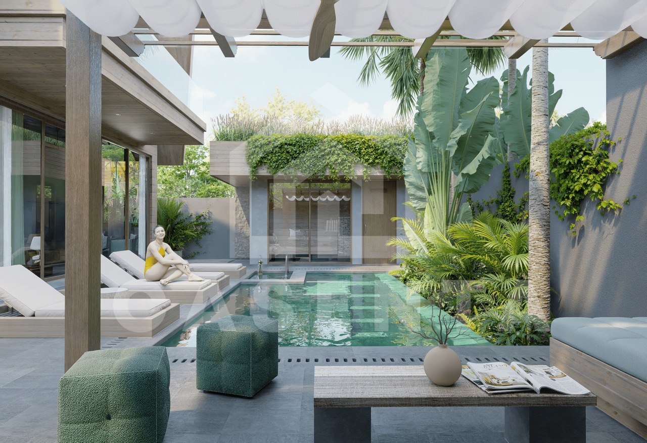 Poolside lounge area in Ubud villa with shaded seating, tropical landscaping, and modern outdoor design
